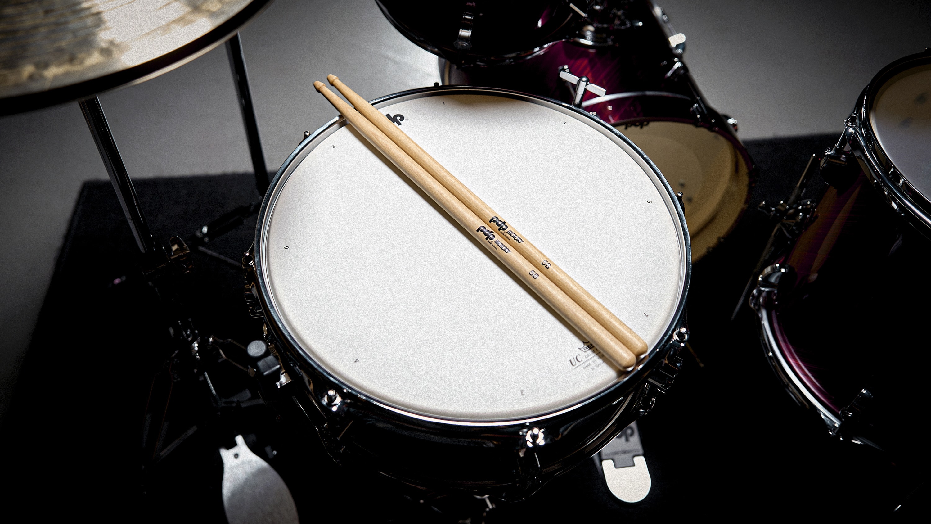 PDP Hickory Drumsticks on a drum
